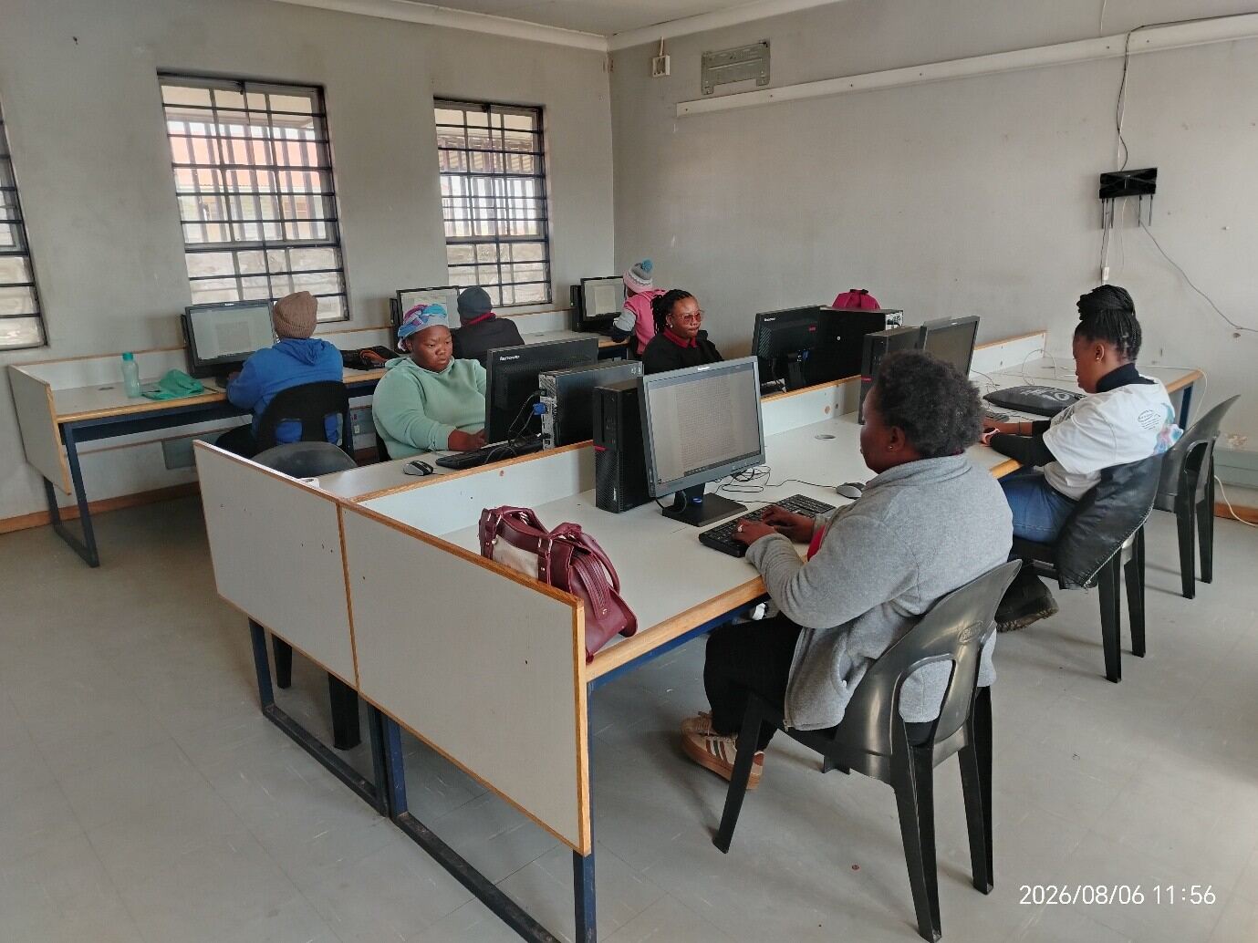 Learners taking part in computer training at the centre