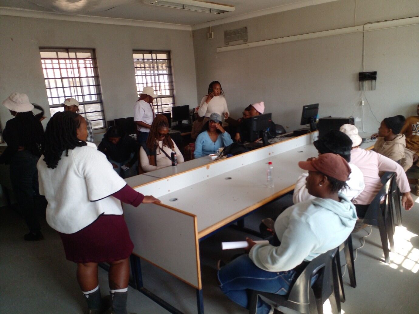 Young people using computers at Breaking Chains Community Centre